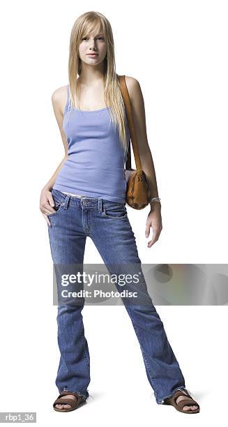 full length shot head of a young adult blonde female in a blue tank top as she looks at the camera - top of head stock pictures, royalty-free photos & images