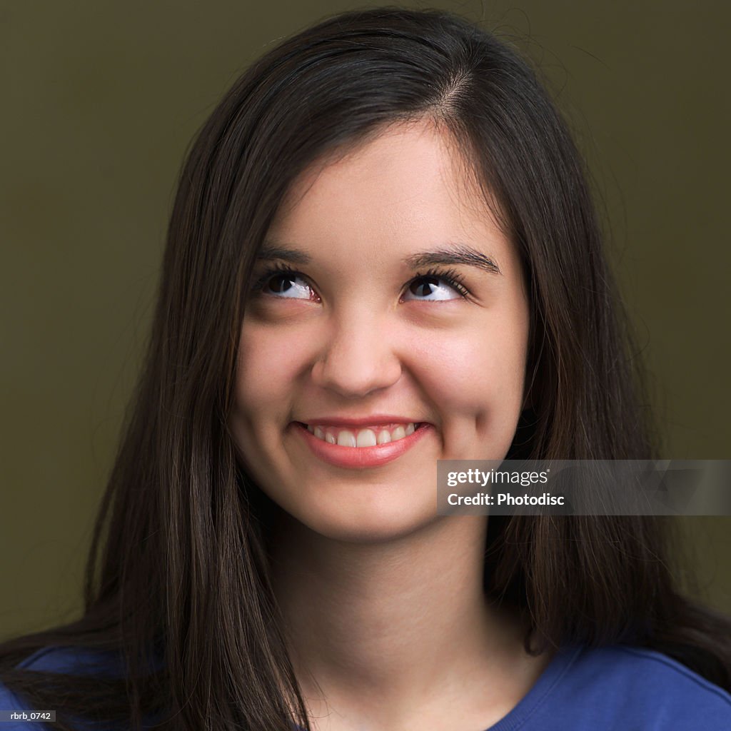 Portrait of caucasian girl smiling looking up