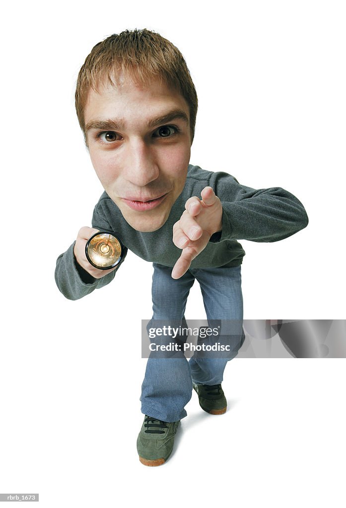 Photo caricature of a caucasian male teen as he examines things with a flashlight