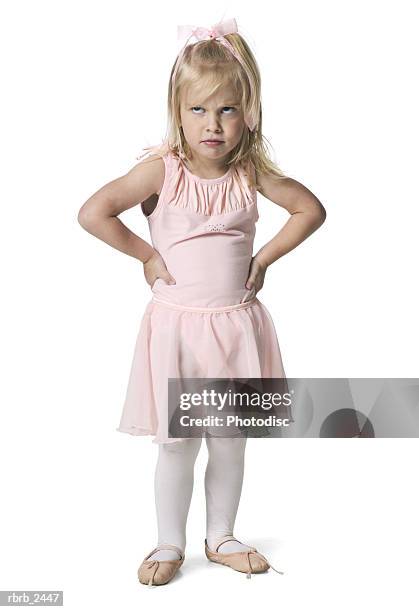 full length shot of a young female child in a pink ballet outfit as she acts annoyed - dancing studio shot stock pictures, royalty-free photos & images