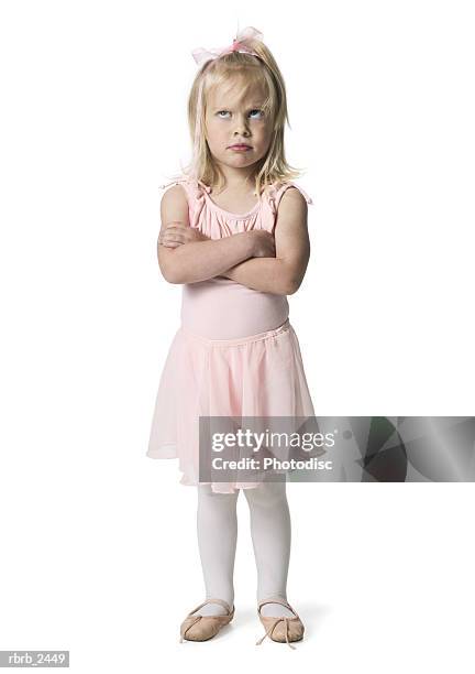 full length shot of a young female child in a pink ballet outfit as she folds her arms and acts annoyed - dancing studio shot stock pictures, royalty-free photos & images