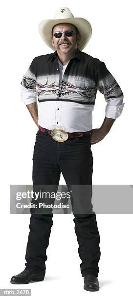 full length shot of an adult male in a cowboy shirt and hat as he looks at the camera - man full body isolated stock pictures, royalty-free photos & images