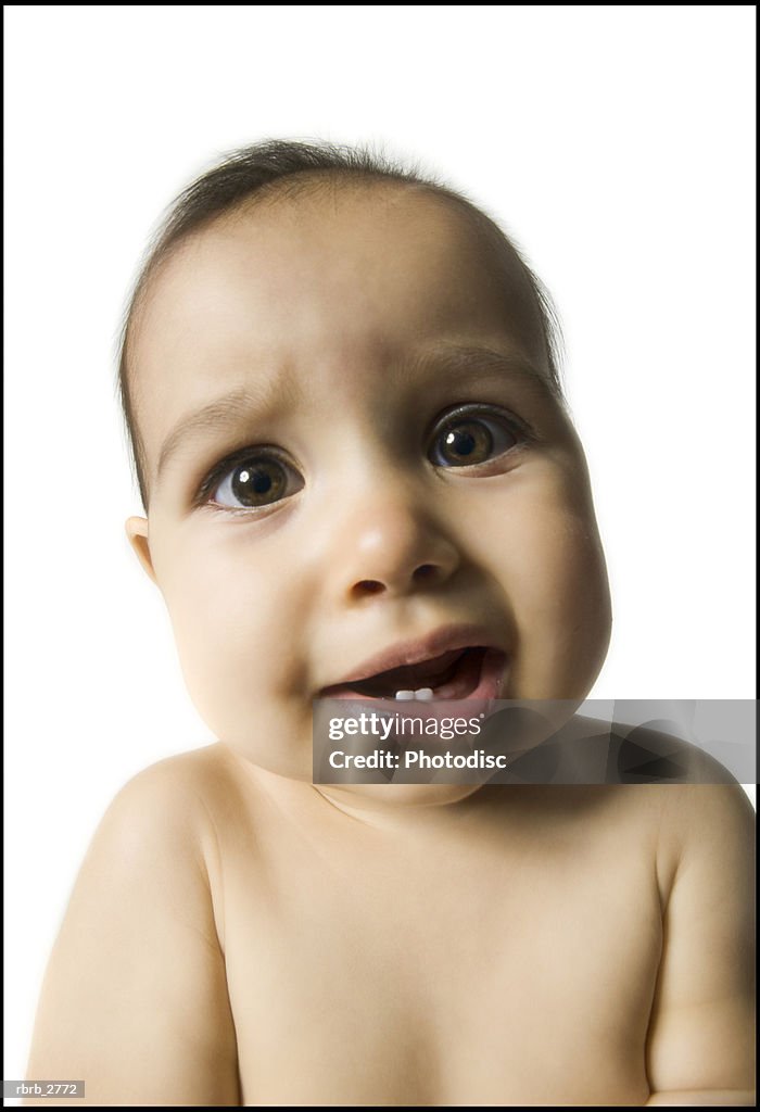 Portrait Of A Female Baby As She Makes A Confused Funny Face High-Res Stock  Photo - Getty Images