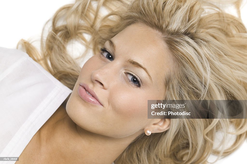 Portrait of a young woman lying down