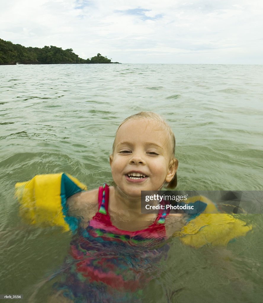 Portrait of a girl in the water at the beach