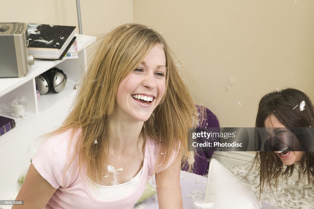 Two teenage girls laughing