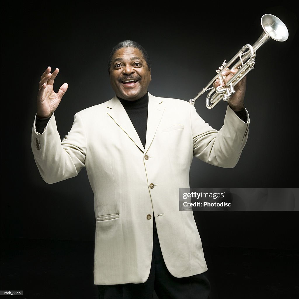 Portrait of a man holding a trumpet