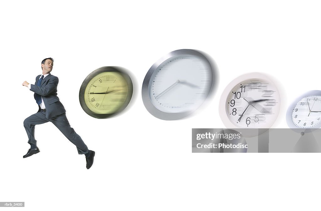 Clock Chasing Man Running With Clocks Chasing Him High-Res Stock Photo - Getty Images