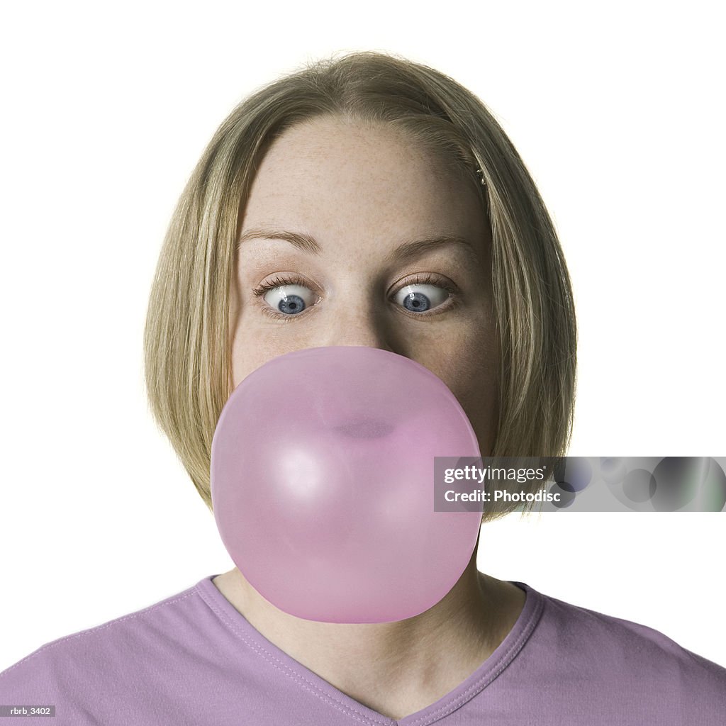 Woman blowing a bubble