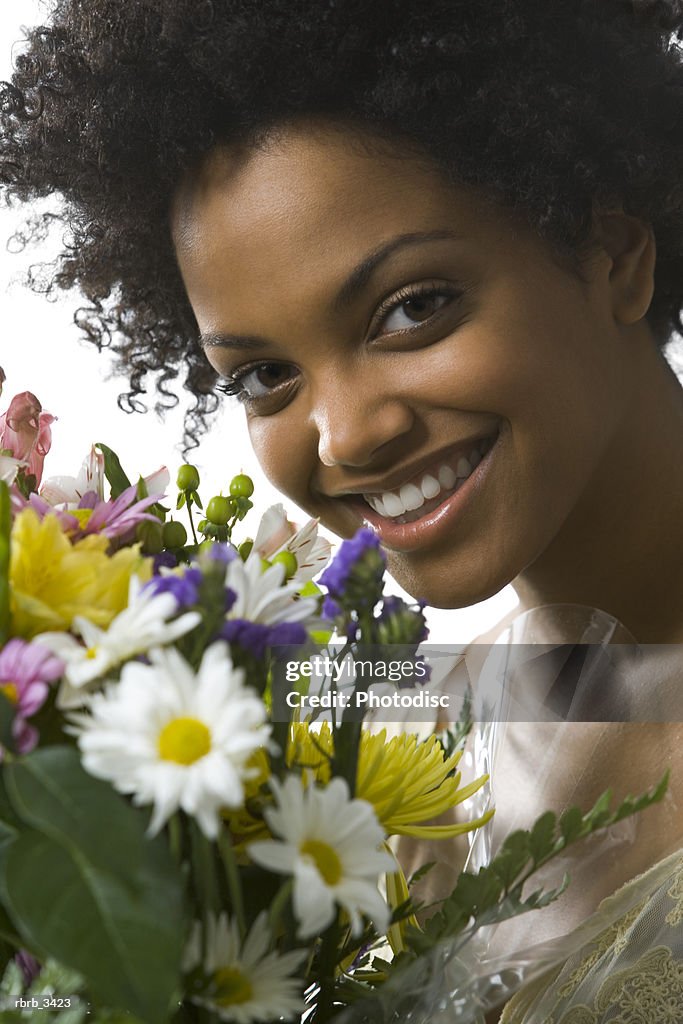 Young woman holding flowers