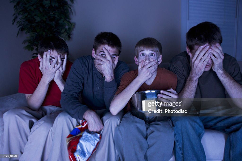 Group of people covering their face