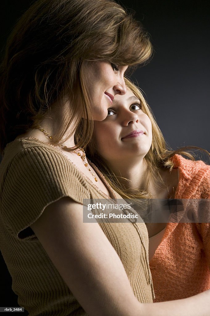 Mother and daughter smiling