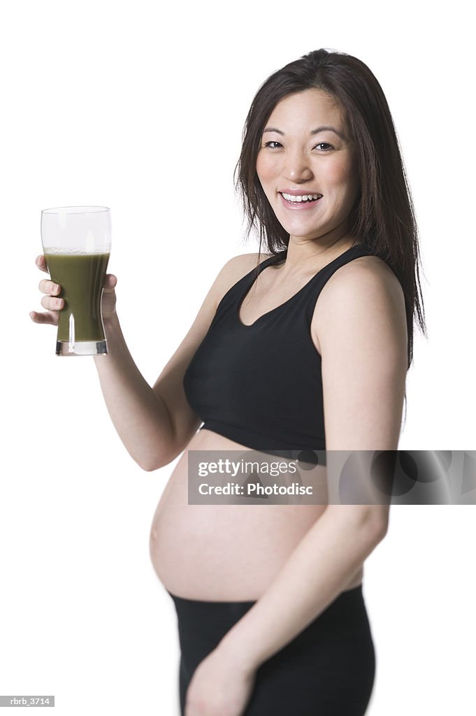 Portrait of a young pregnant woman smiling