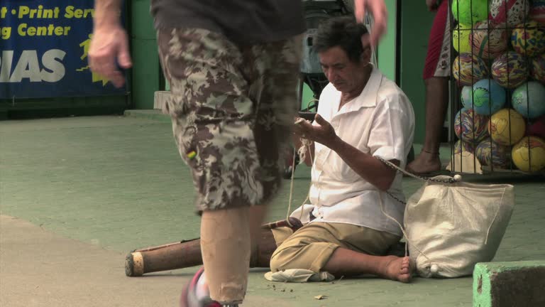 Define Beg Street Begging Videos and HD Footage - Getty Images