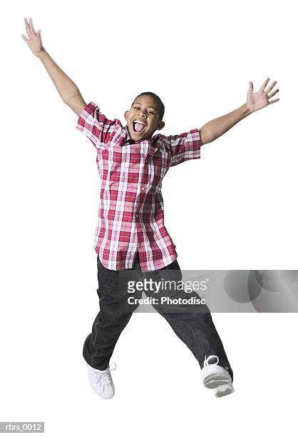 full body shot of a male child as he jumps up and flies through the air - full body isolated bildbanksfoton och bilder
