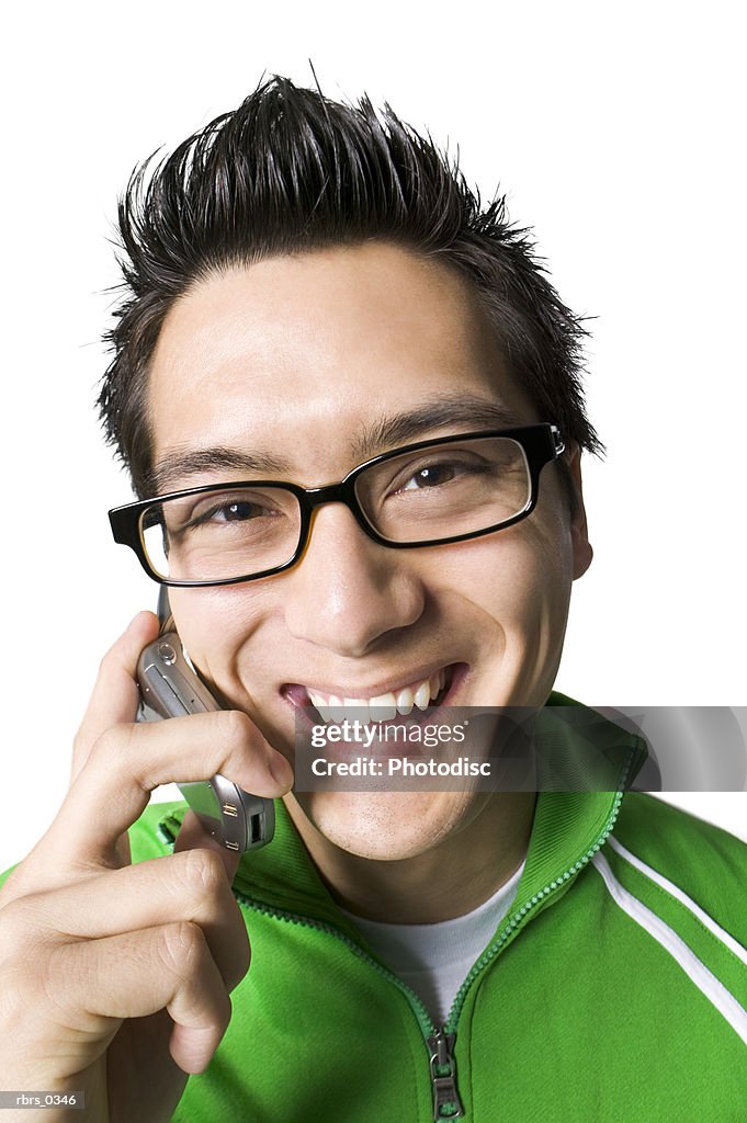 Close-up of a young man using a mobile phone