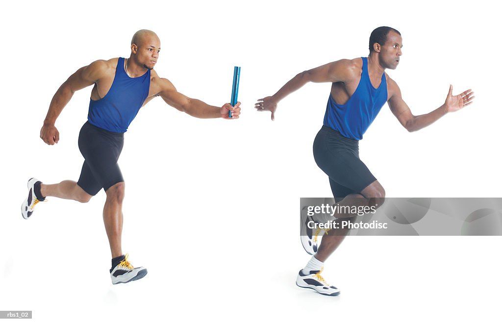 Two young black men in blue tank tops are running a race as they pass a blue baton