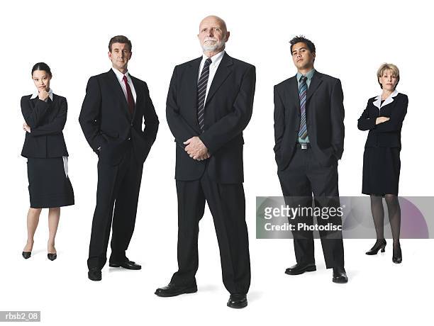 a group of business people line up in a row and look sternly into the camera - the row stock pictures, royalty-free photos & images