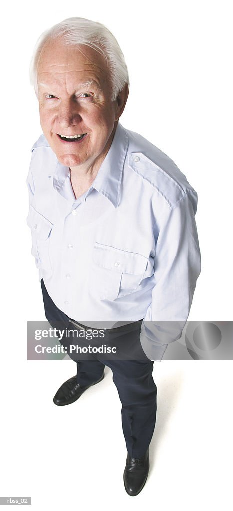 Birdseye view of an elderly man smiling for the camera.