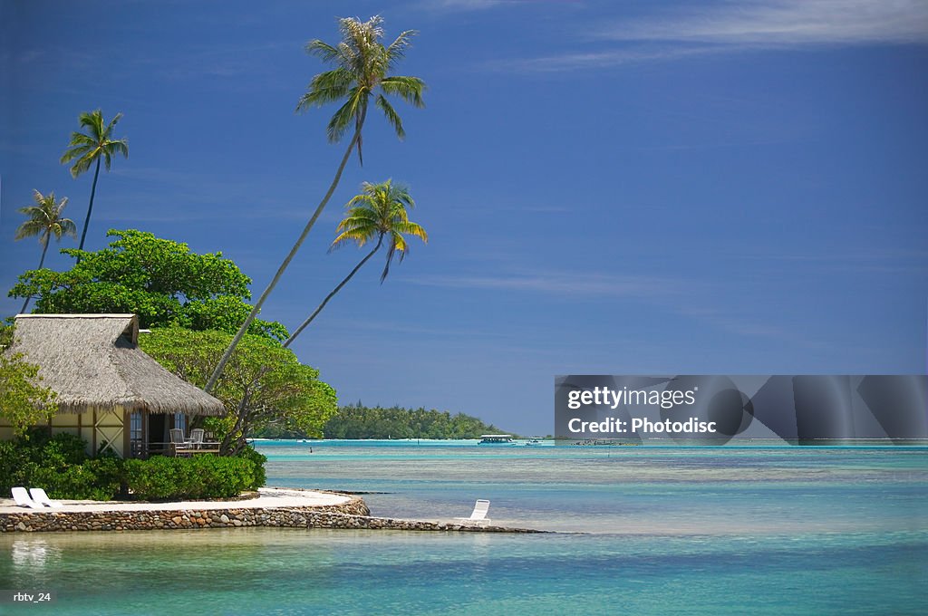 Landscape photograph of a beautiful beach and hut in a tropical locale
