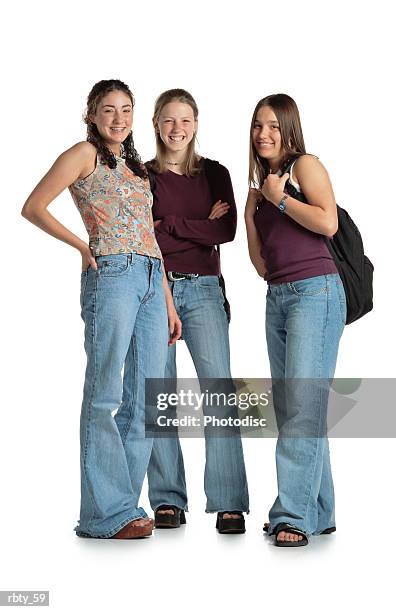 three caucasian teenage girls smile while looking into the camera - smile imagens e fotografias de stock