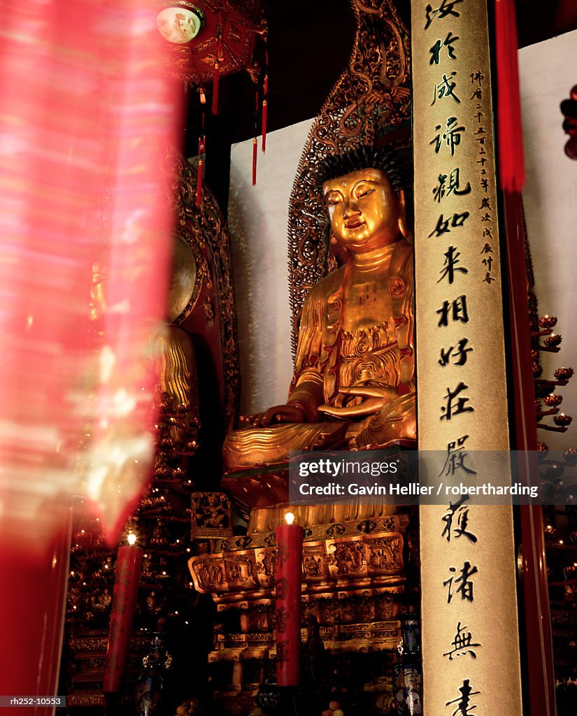 Gold seated Buddha statue, Heavenly King Hall, Jade Buddha temple, Yufo Si, Shanghai, China, Asia