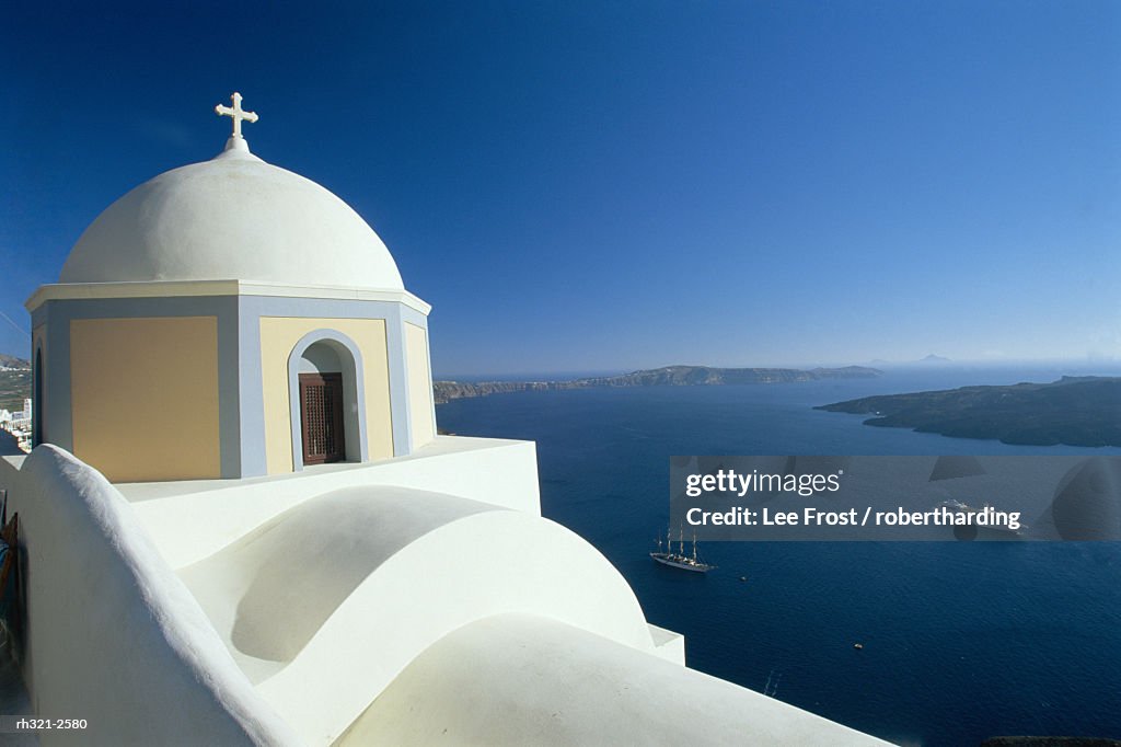 Domed church and view out to sea, Fira, Santorini, Greece