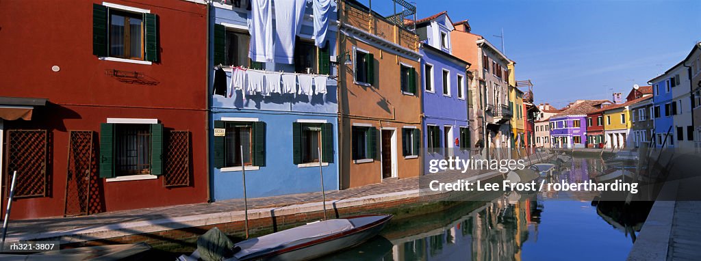 Panoramic view of canal, colourful houses and reflections, Burano, Venice, Veneto, Italy, Europe