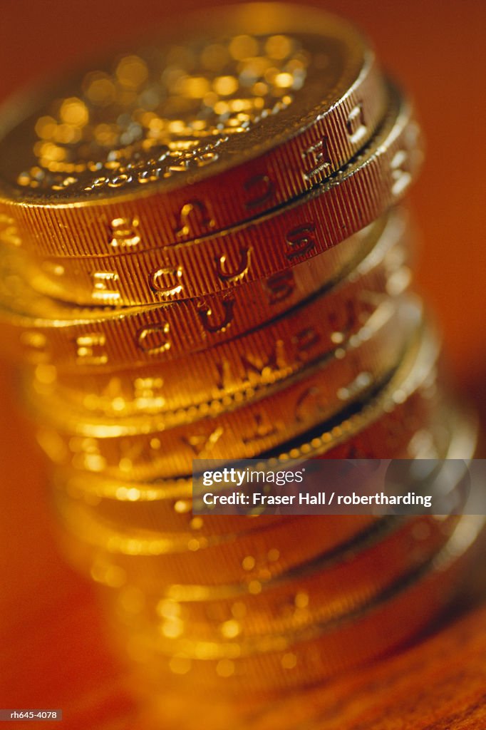 UK currency, stack of one pound coins