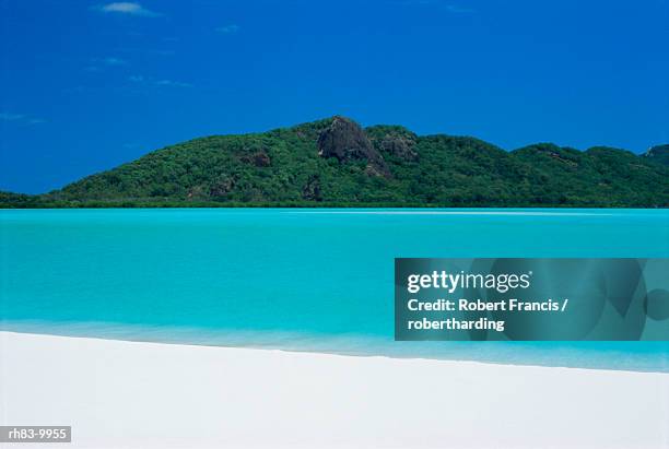 whitehaven beach, one of the finest in the country, on the east coast of whitsunday island, whitsunday group, queensland, australia - east beach stock pictures, royalty-free photos & images