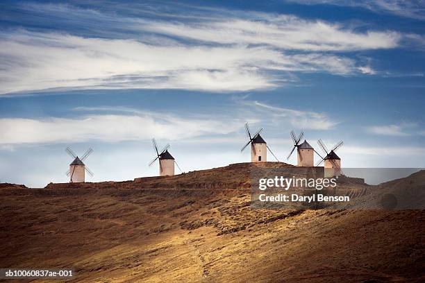 spain, la mancha, consuerga, windmills on hill - castilla la mancha stock pictures, royalty-free photos & images