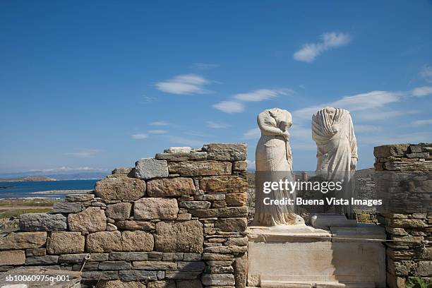 greece, cyclades islands, delos, the house of cleopatra, statues of cleopatra and dioskuridis - cleopatra statue stock pictures, royalty-free photos & images