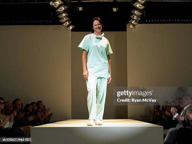 female nurse on catwalk, portrait - pasarela de moda fotografías e imágenes de stock