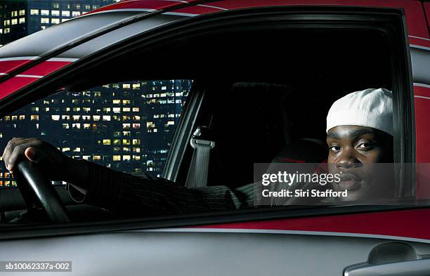 young man in sports car at night, portrait, head and shoulders - pimp imagens e fotografias de stock