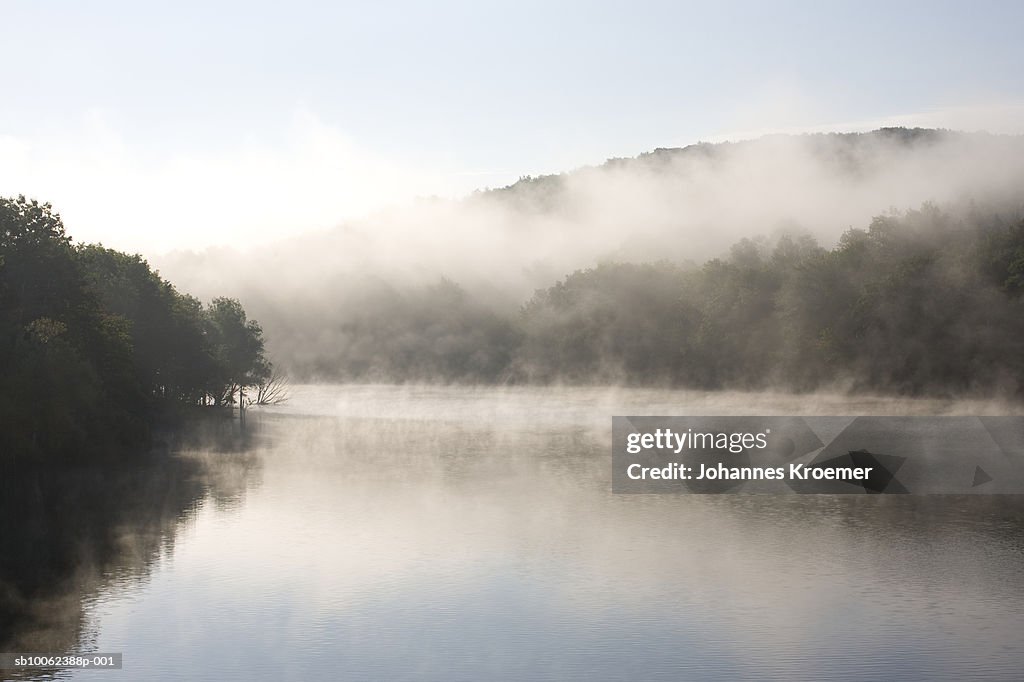 Lake in morning fog