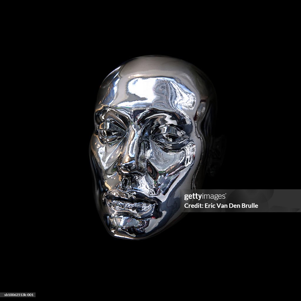 Silver mask on black background