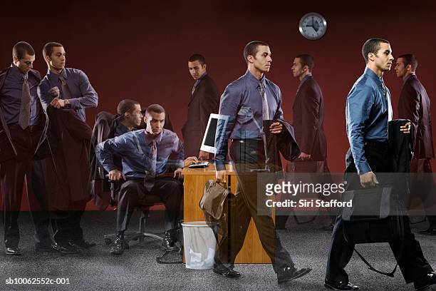 businessman in office (multiple exposure) - repetition foto e immagini stock