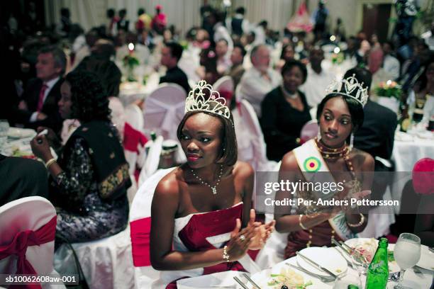 Unidentified beauty queens watch the Miss Congo Contest on April 21, 2006 in central Kinshasa, Congo, DRC. About twenty girls from all over Congo,...