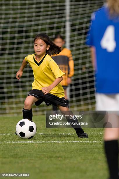 girls (8-9) playing football - asian championship bildbanksfoton och bilder