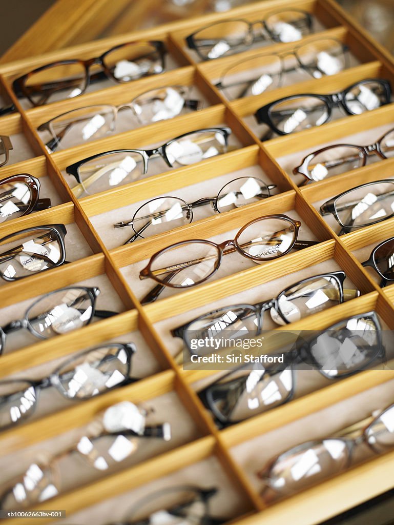 Display case of eyeglasses, close-up, high angle view