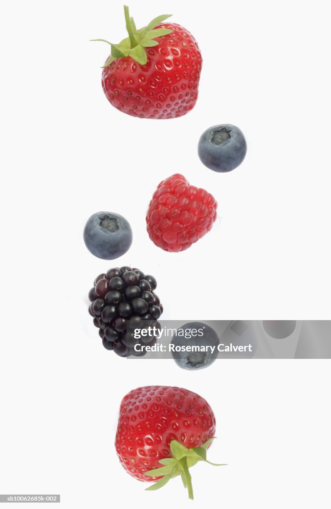 Berries against white background, overhead view, close-up