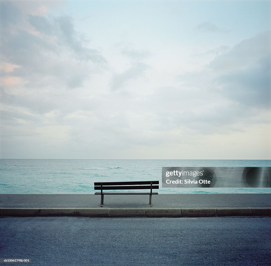 Bench in front of ocean