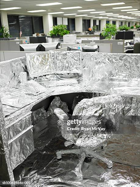 cubicle covered in foil - mischief stock pictures, royalty-free photos & images