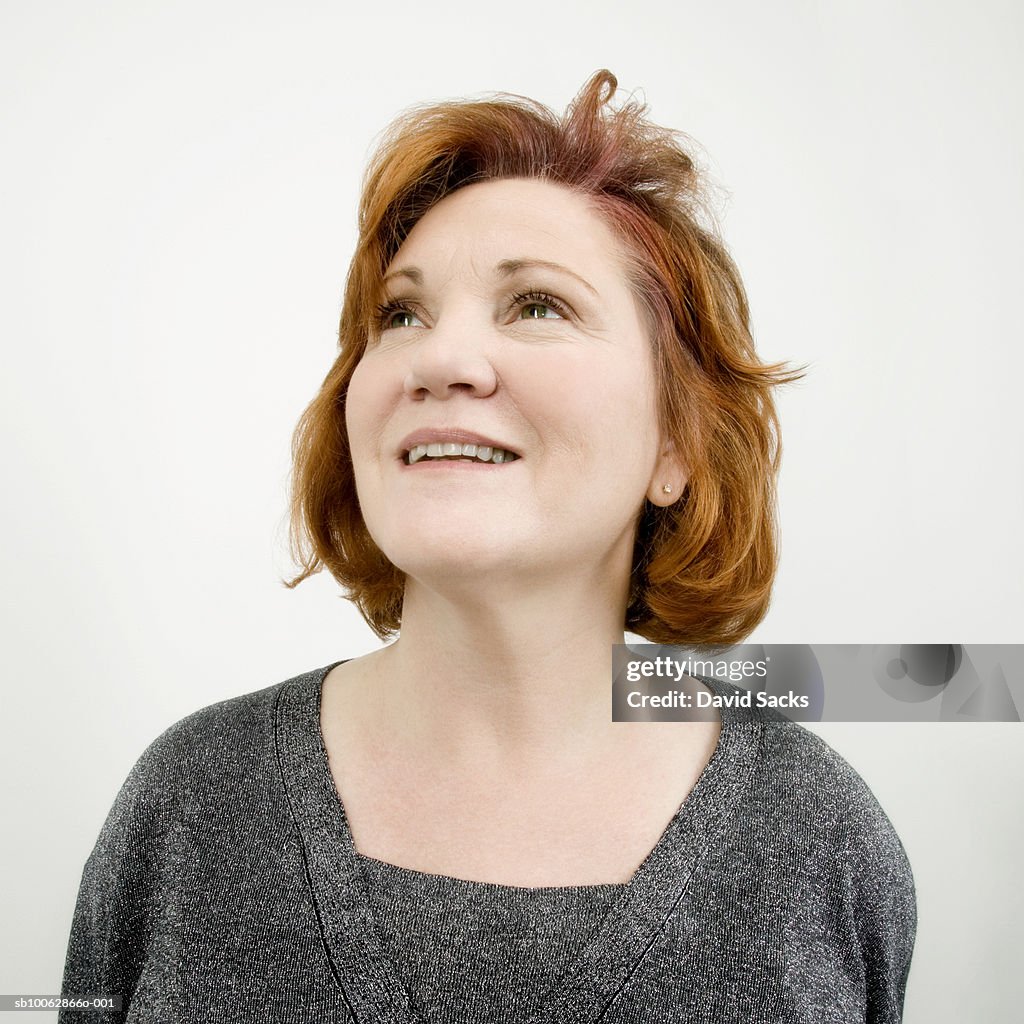 Mature woman looking up, close-up, portrait