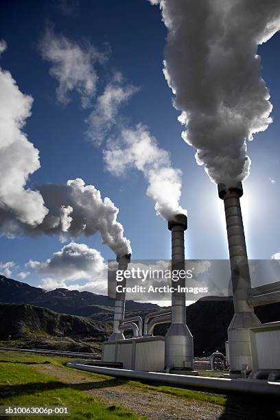 steam rising from power plant chimneys - arctic triple stock pictures, royalty-free photos & images