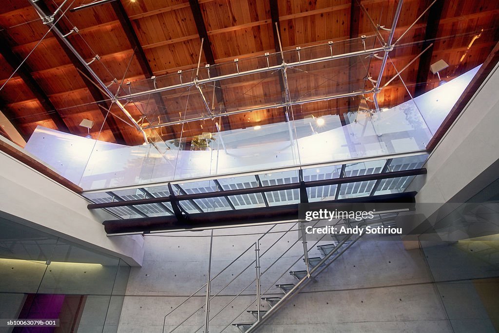 Entrance to architect's studio via glass and steel elevated walkway