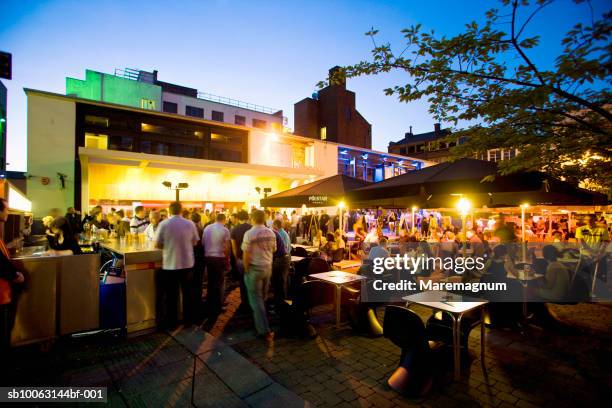 people at outdoor restaurant - caft stock pictures, royalty-free photos & images