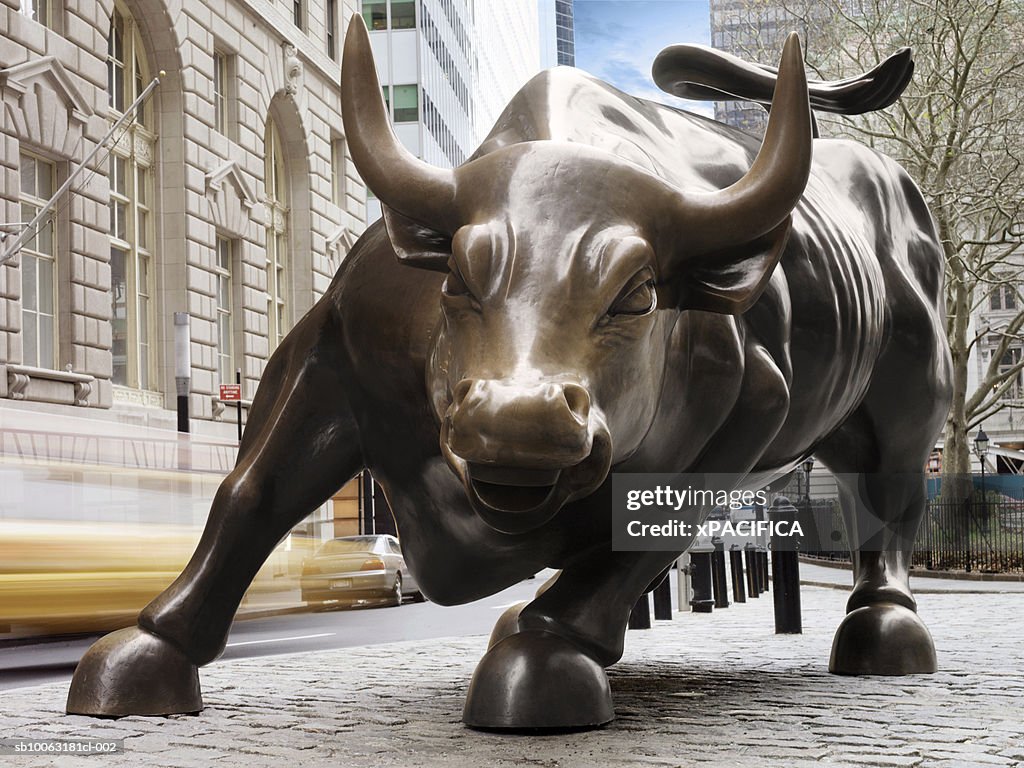 USA, New York, New York City, Wall Street, bronze statue of charging bull