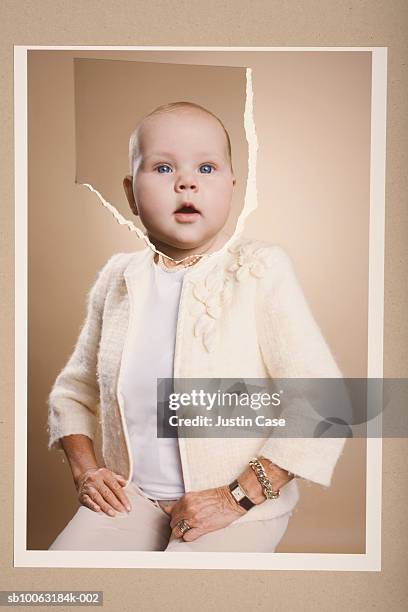 montage picture of baby girl (5 months) and senior woman wearing sweater - baby creativity ideas stock-fotos und bilder