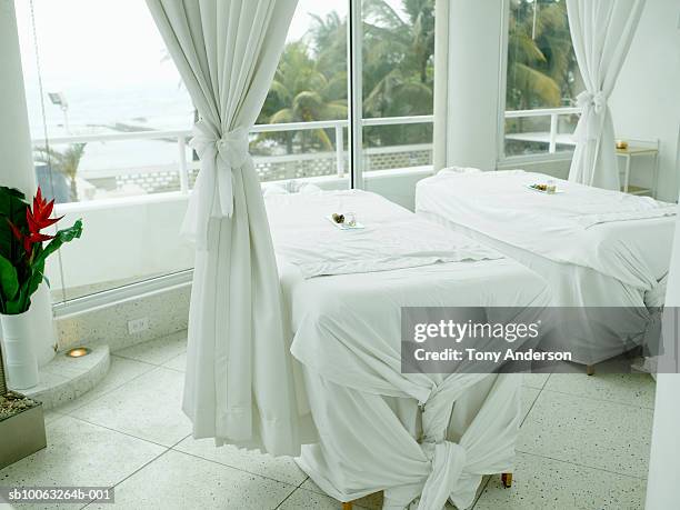 massage table in hotel - massage table no people stock pictures, royalty-free photos & images